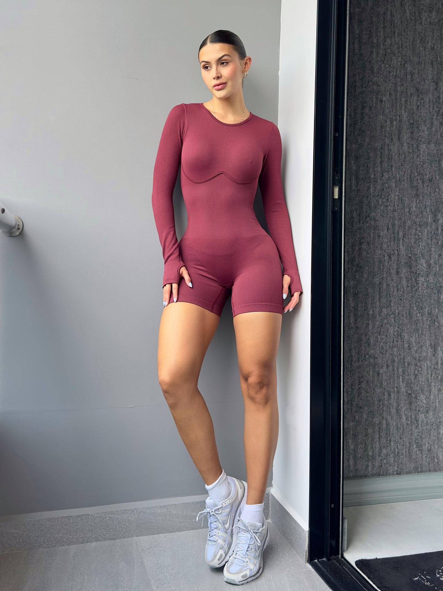 ENTERIZO CORTO MANGA LARGA SESGO